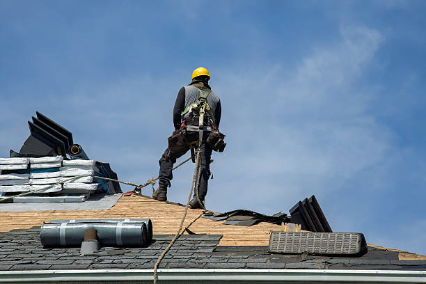 Professional Roof Replacement technician working in Gill, MA